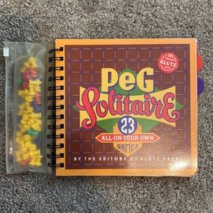 Klutz brand peg solitaire spiral book of 23 games